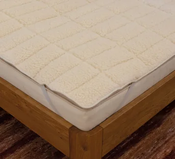 Surmatelas en fibres de laine « Pecora » 