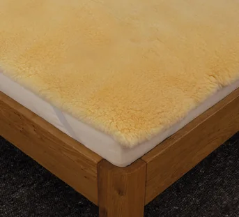 Surmatelas en peau d'agneau « Ovina » 